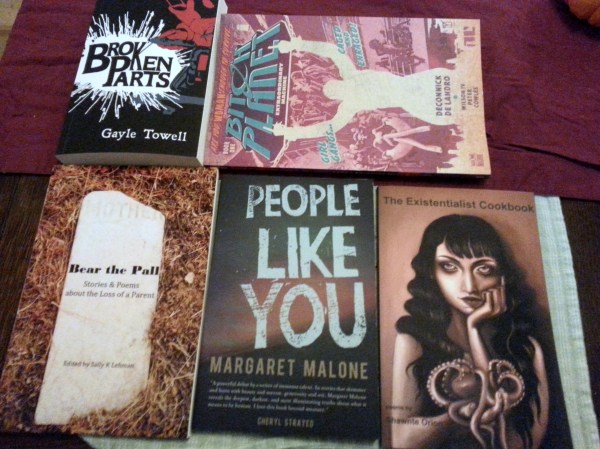 Clockwise from top-left: BODY PARTS, by Gayle Towell; BITCH PLANET, by name; TITLE by Shawne ???; PEOPLE LIKE YOU, by Margaret Malone; BEAR THE PALL, edited by Sally K. Lehman